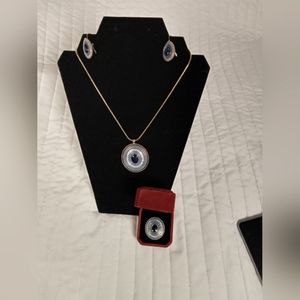 Beautiful gold tone multistage of blue green beaded jewelry set.